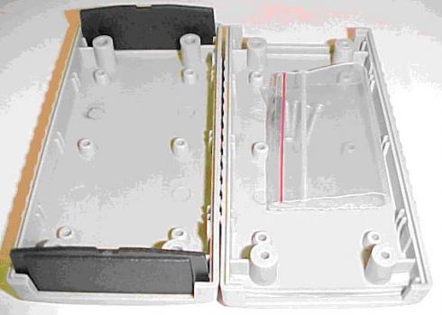 G113 - LAITEKOTELO 120x60x30mm harmaa, musta