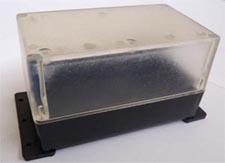 G087T - Läpinäkyvä seinään kiinnitettävä LAITEKOTELO 120x70x65mm